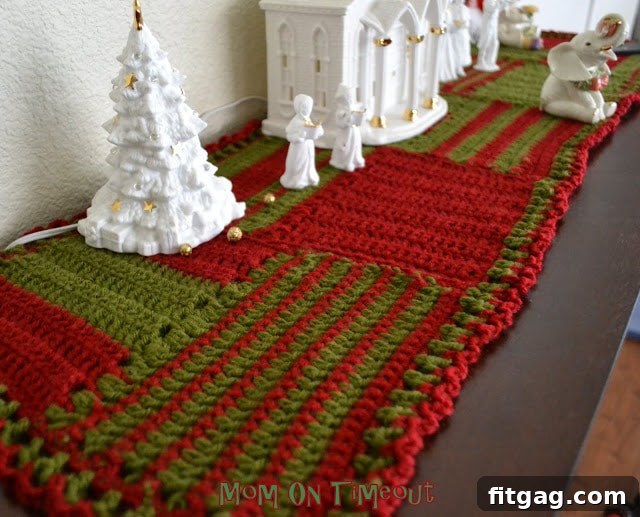 Charming Holiday Crochet Table Runner 2 Close-up of the crocheted Christmas runner showing textured single and double crochet stitches in red and green