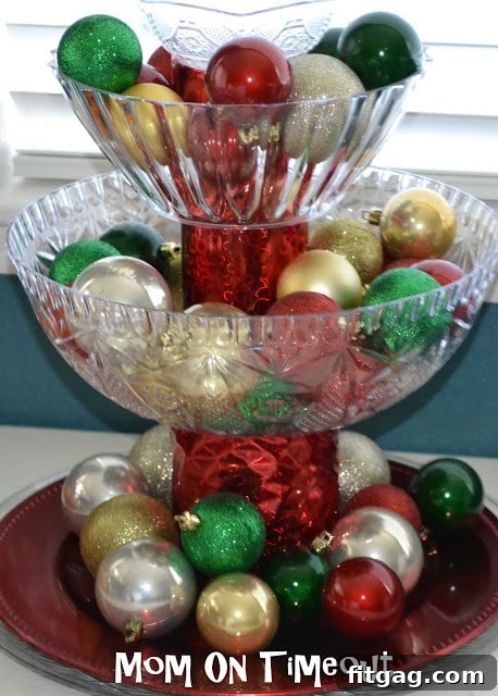 Finished tiered Christmas decoration display filled with colorful shatterproof ornaments.