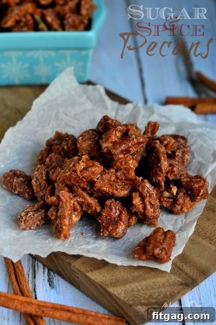A large serving bowl overflowing with Sugar and Spice Pecans, perfect for sharing.