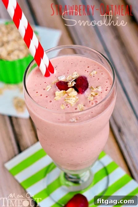 A vibrant Strawberry Oatmeal Smoothie made with Greek yogurt, honey, and oats, ready to energize your morning.