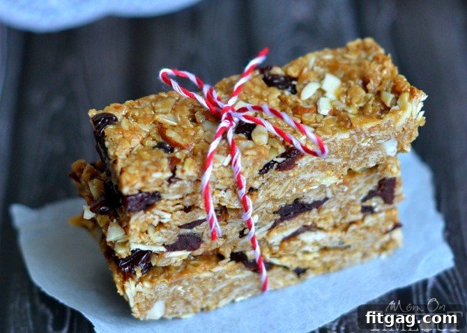 Homemade Granola Bars are SO much better than store bought! Chewy, 10 minutes to make and NO BAKE! You're going to love these Cherry Almond Granola Bars! Chewy Granola Bars with visible cherries and almonds