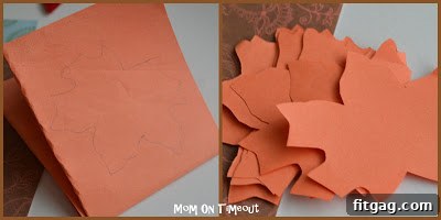 Cutting out Thanksgiving Gratitude Leaves