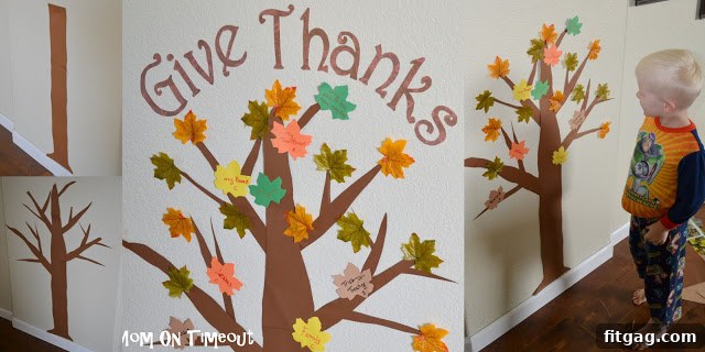 Displaying 'Give Thanks' Banner Above Thanksgiving Tree