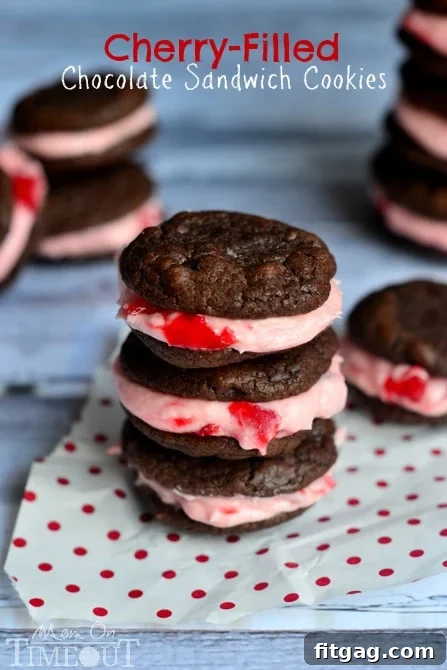 Homemade Chocolate Cherry Sandwich Cookies Close-up of a Cherry Filled Chocolate Sandwich Cookie showing the rich chocolate and pink cherry filling