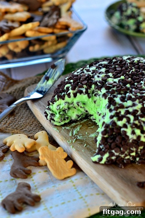 Kids enjoying Mint Chocolate Chip Cheese Ball with animal crackers for an after-school snack