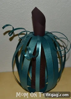 Patchwork Pumpkins 11 A completed handmade Scrappy Pumpkin with paper strips, stem, and tendrils.