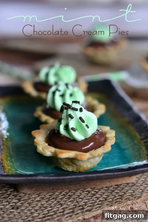 Individual Mini Chocolate Mint Cream Pie garnished with chocolate shavings.