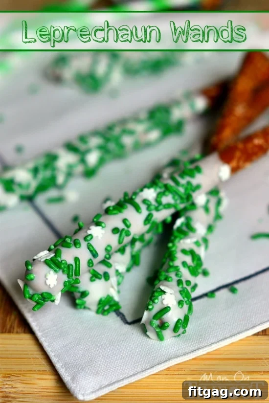 Charming Leprechaun Pretzel Wands, featuring green jimmies and white snowflake sprinkles for a festive St. Patrick's Day treat.