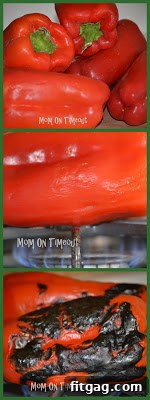 Fresh red bell peppers piled on a counter