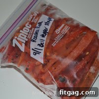 Flash-frozen roasted red bell pepper strips on a baking sheet