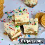 Whimsical Funfetti Oreo Cheesecake Bars 2 Close-up of a Funfetti Oreo Cheesecake Bar, showing the thick topping and festive sprinkles.