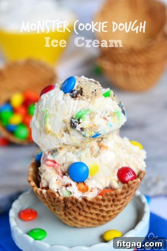 Monster Cookie Dough Ice Cream - made with eggless, edible cookie dough. NO MACHINE NEEDED | MomOnTimeout.com Delicious Monster Cookie Dough Ice Cream, a no-churn recipe featuring eggless edible cookie dough with M&Ms, oats, and chocolate chips.