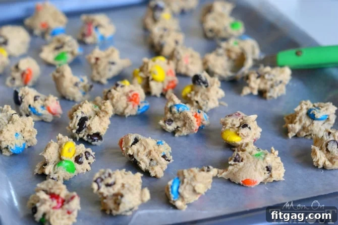 Monster Cookie Dough Ice Cream - made with eggless, edible cookie dough. NO MACHINE NEEDED | MomOnTimeout.com Edible cookie dough balls ready for flash freezing