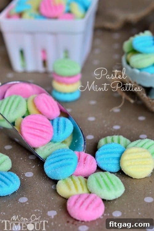 A close-up of a single Pastel Mint Patty with a perfect fork imprint, ready for consumption. Represents the simplicity and elegance of these Easter treats.