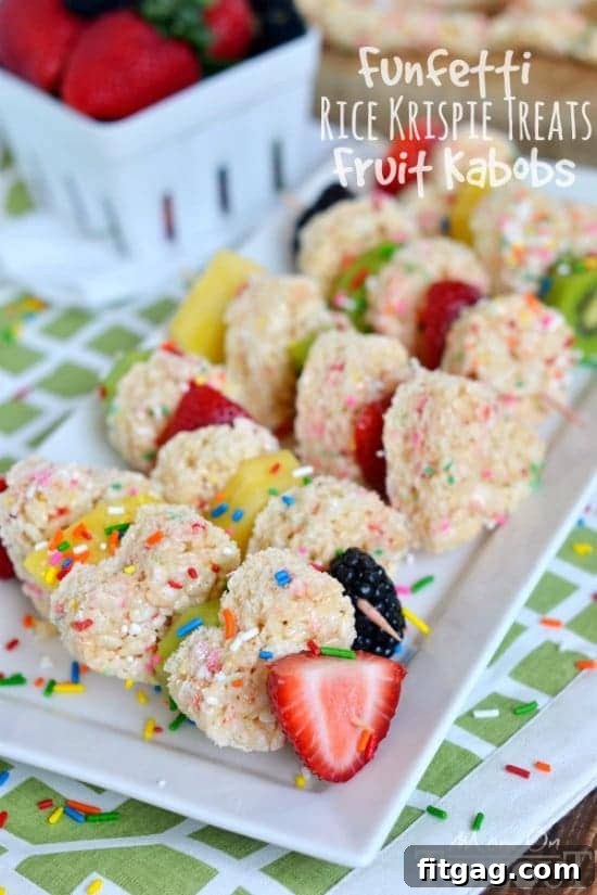 Colorful Funfetti Rice Krispies Treats Fruit Kabobs arranged on a white platter, ready to serve