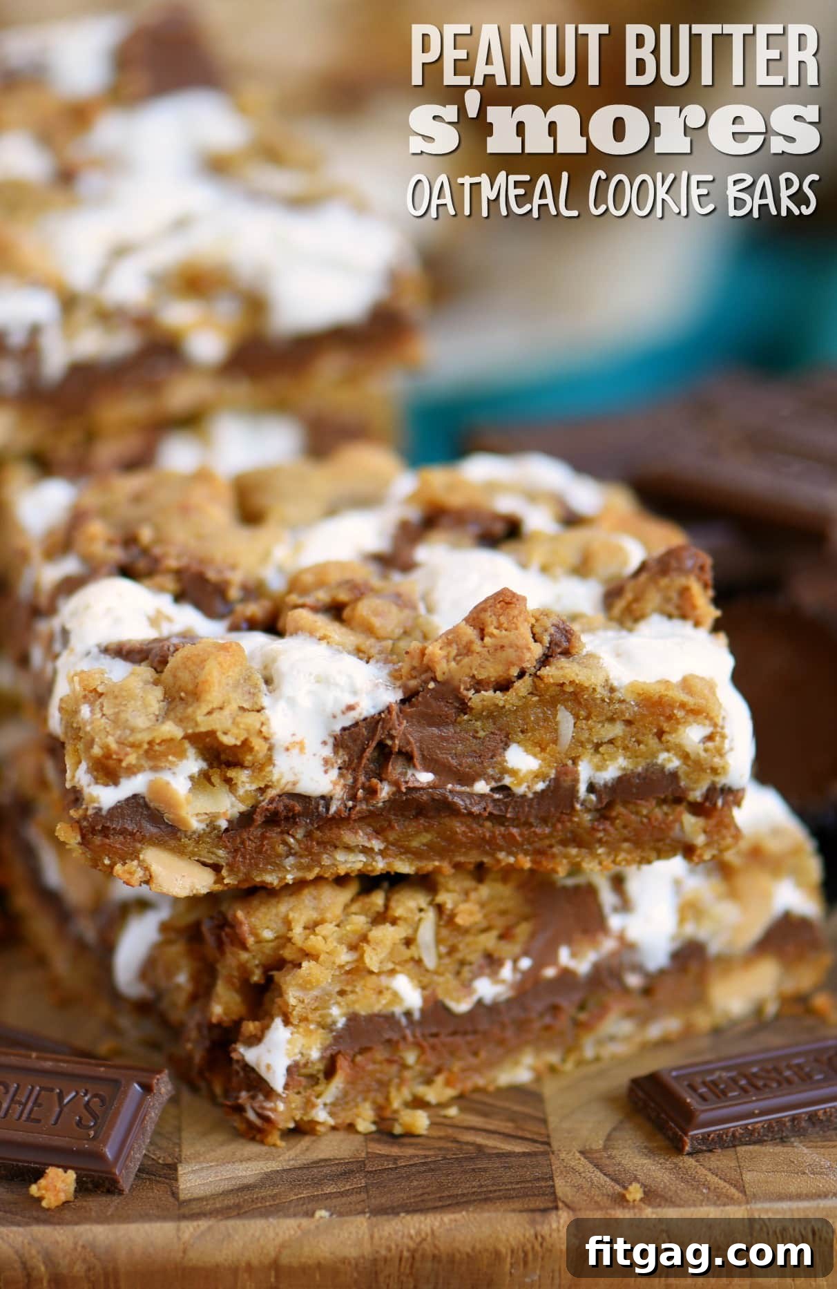 Reese's Peanut Butter S'mores Oatmeal Cookie Bars because you don't need an open flame to enjoy the ultimate s'mores treat! Ooey gooey peanut butter and chocolate perfection in a convenient s'mores cookie bar package. You're gonna love 'em! // Mom On Timeout #smores #chocolate #peanutbutter #reeses #candy #bars #recipe #oatmeal #cookie #cookies #dessert #desserts #baking Reese's Peanut Butter S'mores Oatmeal Cookie Bars recipe title