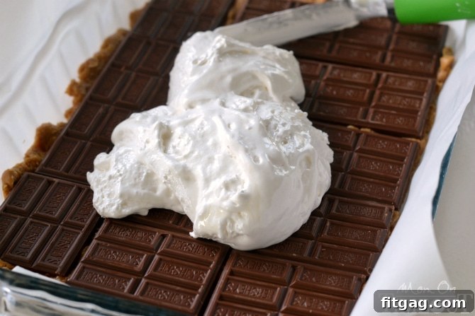 Decadent Reese's Peanut Butter S'mores Oatmeal Cookie Bars 3 Reese's Peanut Butter S'mores Oatmeal Cookie Bars - total indulgence in each bite! | MomOnTimeout.com