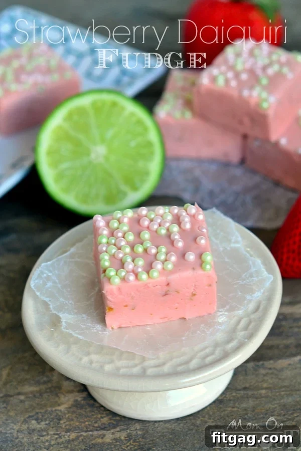 Creamy Strawberry Daiquiri Fudge squares, a perfect blend of strawberry and lime flavors for a party dessert.