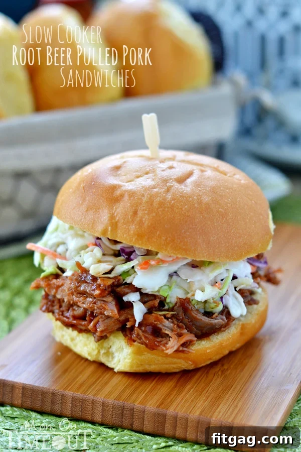 Close-up of a Slow Cooker Root Beer Pulled Pork Sandwich garnished with fresh parsley on a wooden board.