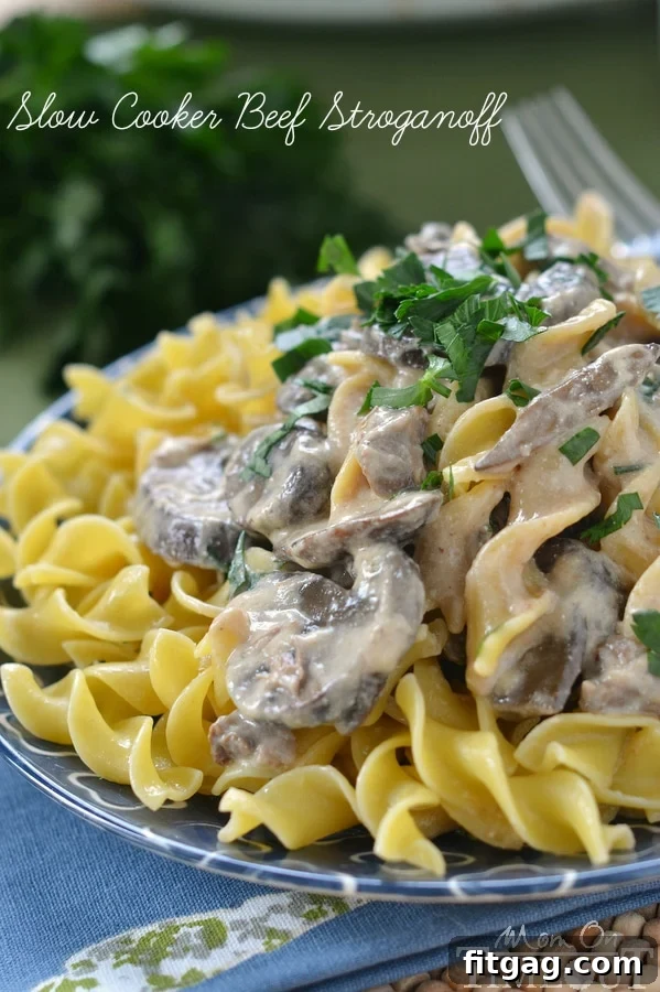 Creamy Slow Cooker Beef Stroganoff with a rich, thick sauce.