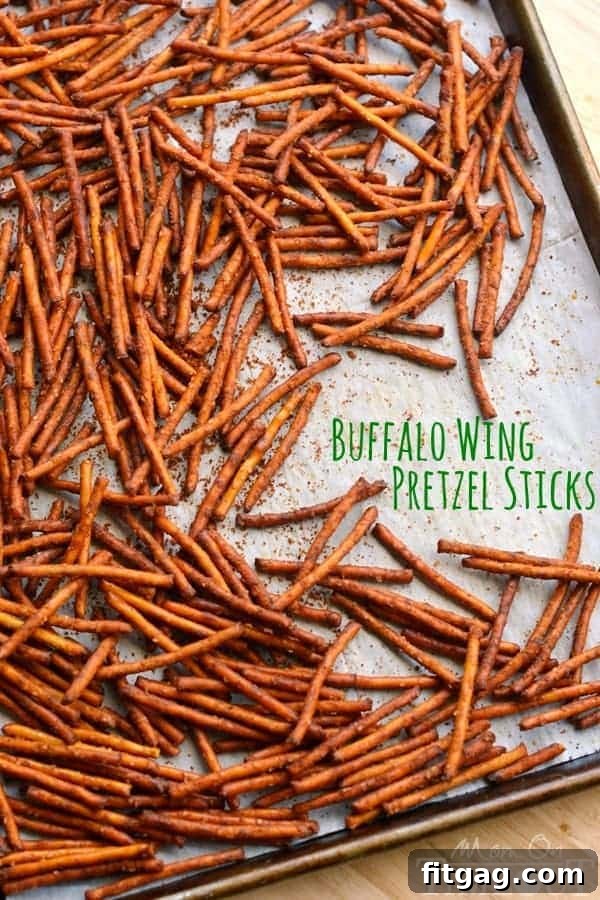 These Buffalo Wing Pretzel Sticks are the perfect snack to enjoy while watching the game! | MomOnTimeout.com | #recipe #appetizer #football #snack