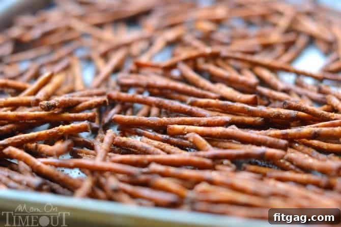 These Buffalo Wing Pretzel Sticks are the perfect snack to enjoy while watching the game! | MomOnTimeout.com | #recipe #appetizer #football #snack
