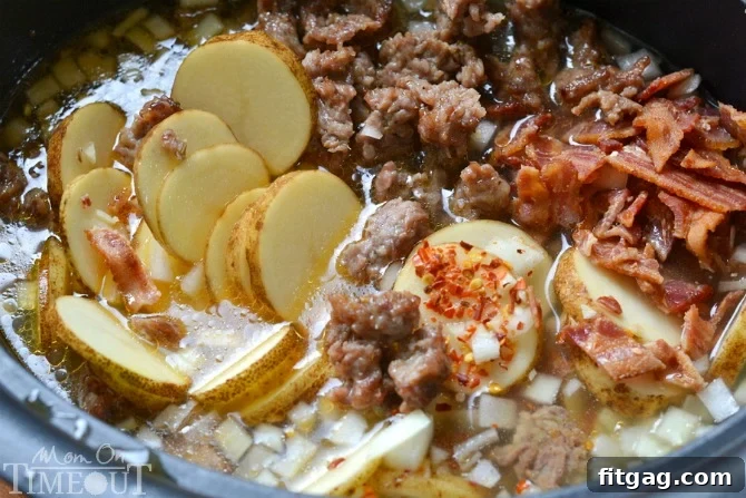Hearty Slow Cooker Zuppa Toscana 3 Hearty and comforting Slow Cooker Olive Garden's Zuppa Toscana Soup, a perfect family meal.
