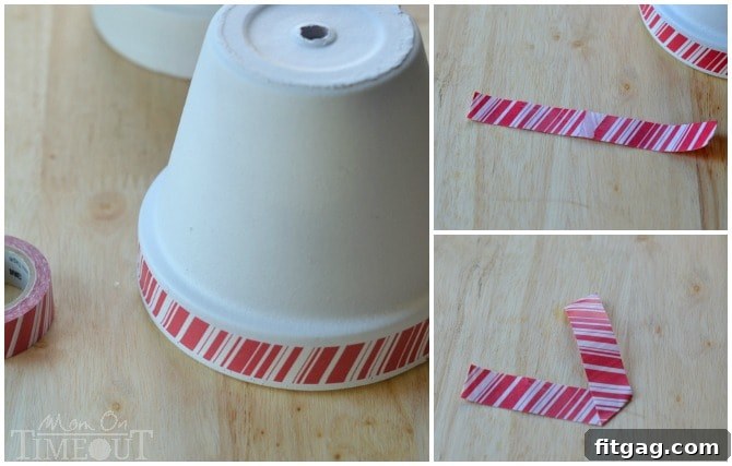 Decorating the rim of the clay pot snowman with washi tape