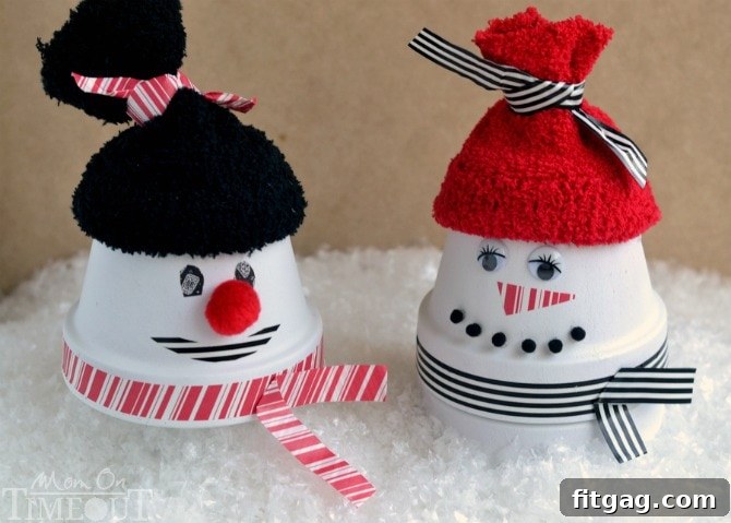 Finished collection of adorable clay pot snowmen for Christmas decor