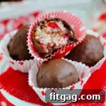 First Lady's Coconut Delights 6 Close-up of Martha Washington Candies, showing the delectable chocolate coating and the vibrant interior of coconut, pecans, and cherries.