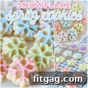 decorated spritz cookies in snowflake design with pastel colors