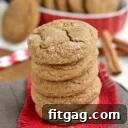 ginger molasses cookies in a stack on red burlap sitting on brown napking
