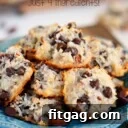 almond joy cookies piles high on a blue plate with title overlay at top