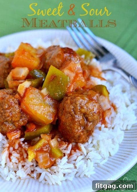 Hearty Grandma's Sweet and Sour Meatballs served in a bowl, generously coated in a glossy, rich sauce.