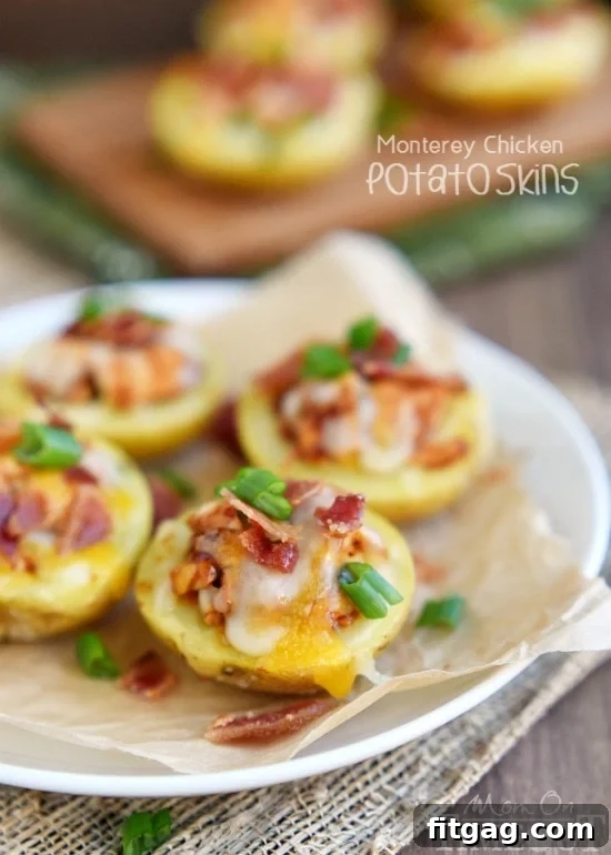 Monterey Chicken Potato Skins - a delicious and easy recipe for BBQ chicken, cheese, and bacon loaded potato skins, perfect for any party or gathering.