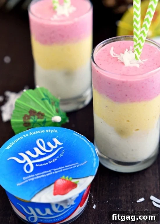 Our delicious layered Tropical Sunrise Smoothie, perfect for a quick, healthy, and kid-friendly breakfast that adds a splash of color to busy mornings.