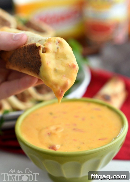 Oven-Crisp Beef Flautas with Creamy Queso Dip 4 Delicious baked beef flautas with a bowl of warm, creamy queso dip on the side.