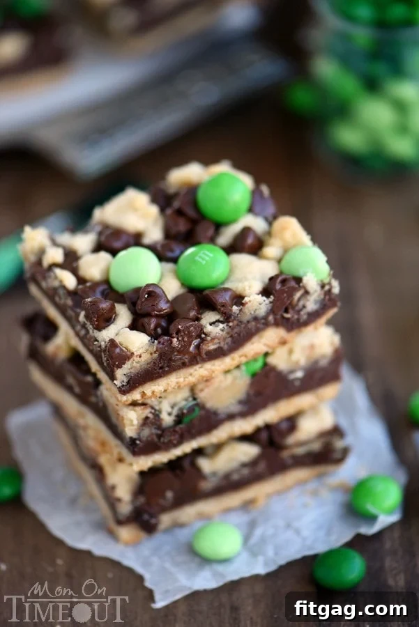 Indulge in these outrageously decadent Chocolate Mint Fudge Crumb Bars for the ultimate chocolate and mint treat! | MomOnTimeout.com | #recipe #dessert #chocolate #mint