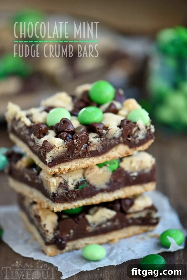 Indulge in these outrageously decadent Chocolate Mint Fudge Crumb Bars for the ultimate chocolate and mint treat! | MomOnTimeout.com | #recipe #dessert #chocolate #mint