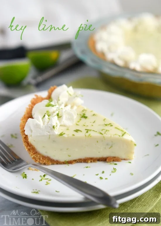 A beautifully baked Key Lime Pie with a golden graham cracker crust, viewed from above, highlighting its simple elegance and inviting texture.