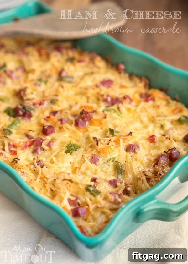 Golden Ham Cheese and Hash Brown Breakfast Delight 2 A golden-brown Ham and Cheese Hash Brown Breakfast Casserole, perfect for using leftover ham. Extra cheesy and delicious, it's quick to prepare and serves many. | MomOnTimeout.com