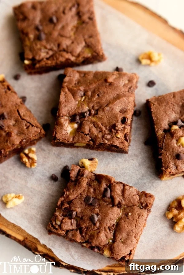 Close-up of caramel nut brownies, showing the rich chocolate and gooey caramel layers
