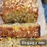 Pina Colada Banana Bread with glaze and toasted coconut