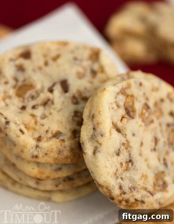 Golden Toffee Fridge Cookies 3 You're just six ingredients away from these glorious Toffee Butter Icebox Cookies! Deliciously buttery and perfectly rich, this easy cookie recipe is the perfect dessert for any day! | MomOnTimeout.com | #cookie