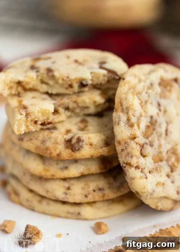 Golden Toffee Fridge Cookies 5 You're just six ingredients away from these glorious Toffee Butter Icebox Cookies! Deliciously buttery and perfectly rich, this easy cookie recipe is the perfect dessert for any day! | MomOnTimeout.com | #cookie