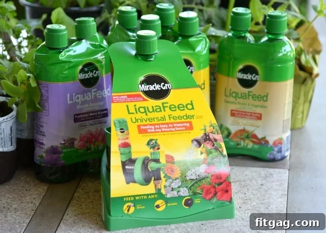 An assortment of Miracle-Gro LiquaFeed bottles, including Bloom Booster and Tomato, Fruits, & Vegetables formulas, displayed alongside the Universal Feeder, illustrating the diverse feeding options available for gardeners.