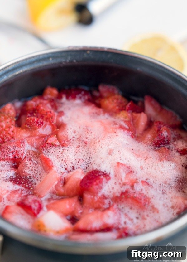 Homemade strawberry ice cream topping cooking