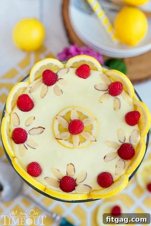 Airy Lemon Raspberry Cheesecake Trifle 3 Close-up shot of the Skinny Lemon Raspberry Cheesecake Trifle, showing vibrant layers of cake, cream, and berries