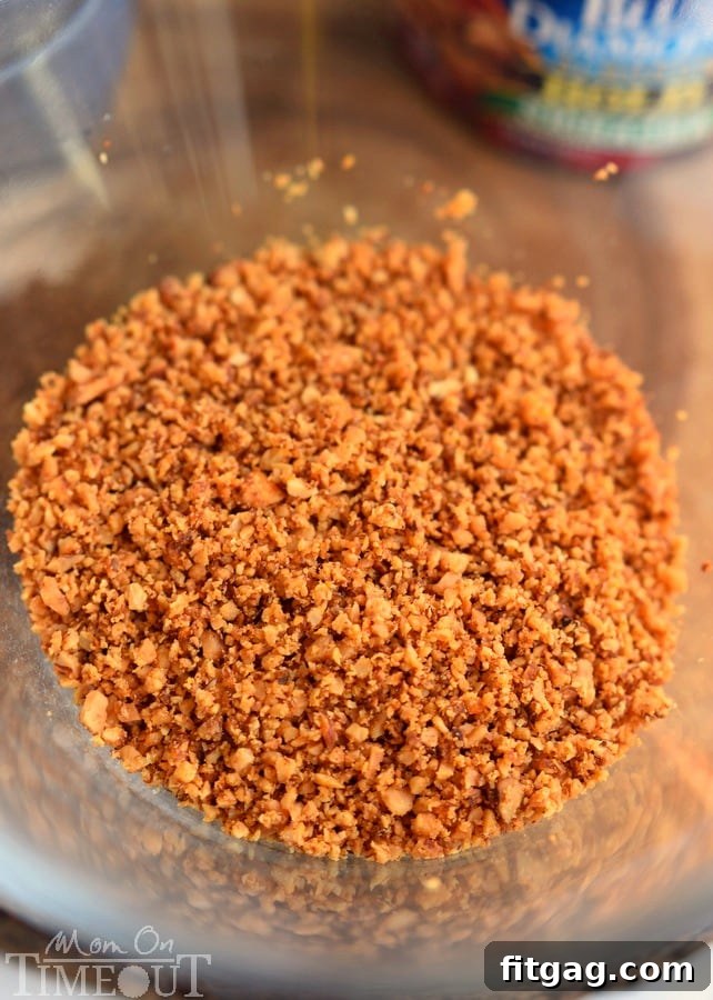 Finely chopped Blue Diamond Sriracha almonds in a clear bowl, ready for breading