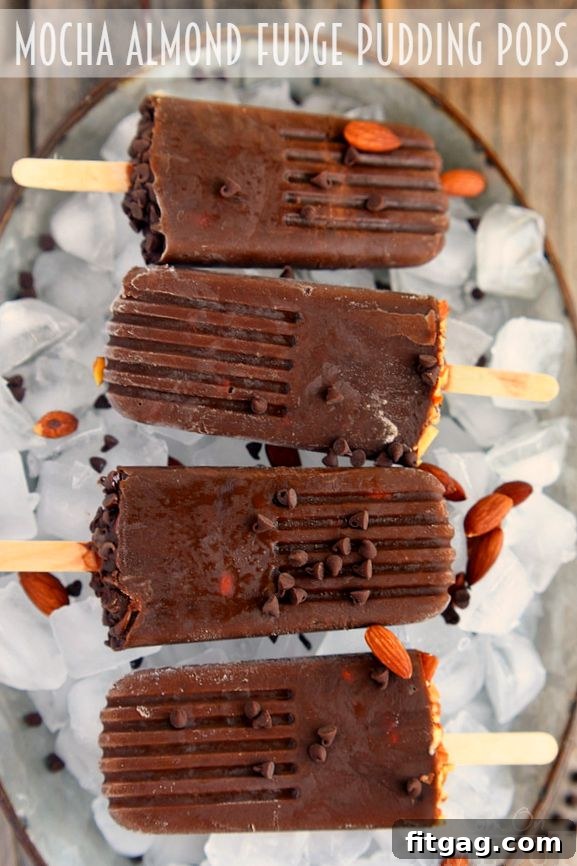 Delicious Mocha Almond Fudge Pudding Pops in a glass, ready to be enjoyed on a hot day